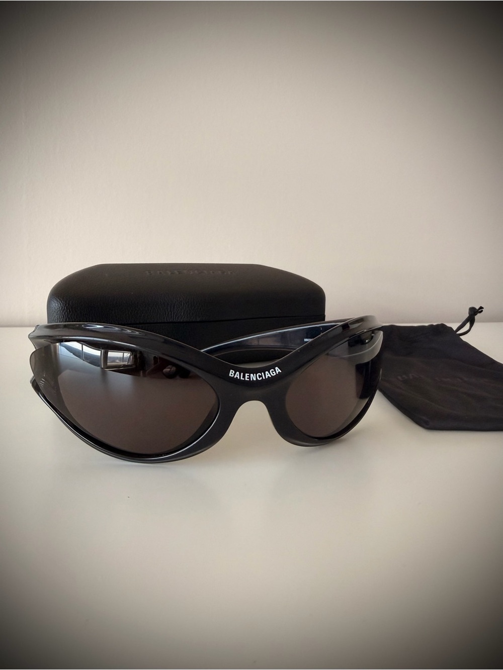 Balenciaga Black Wraparound Sunglasses with Dark Lenses